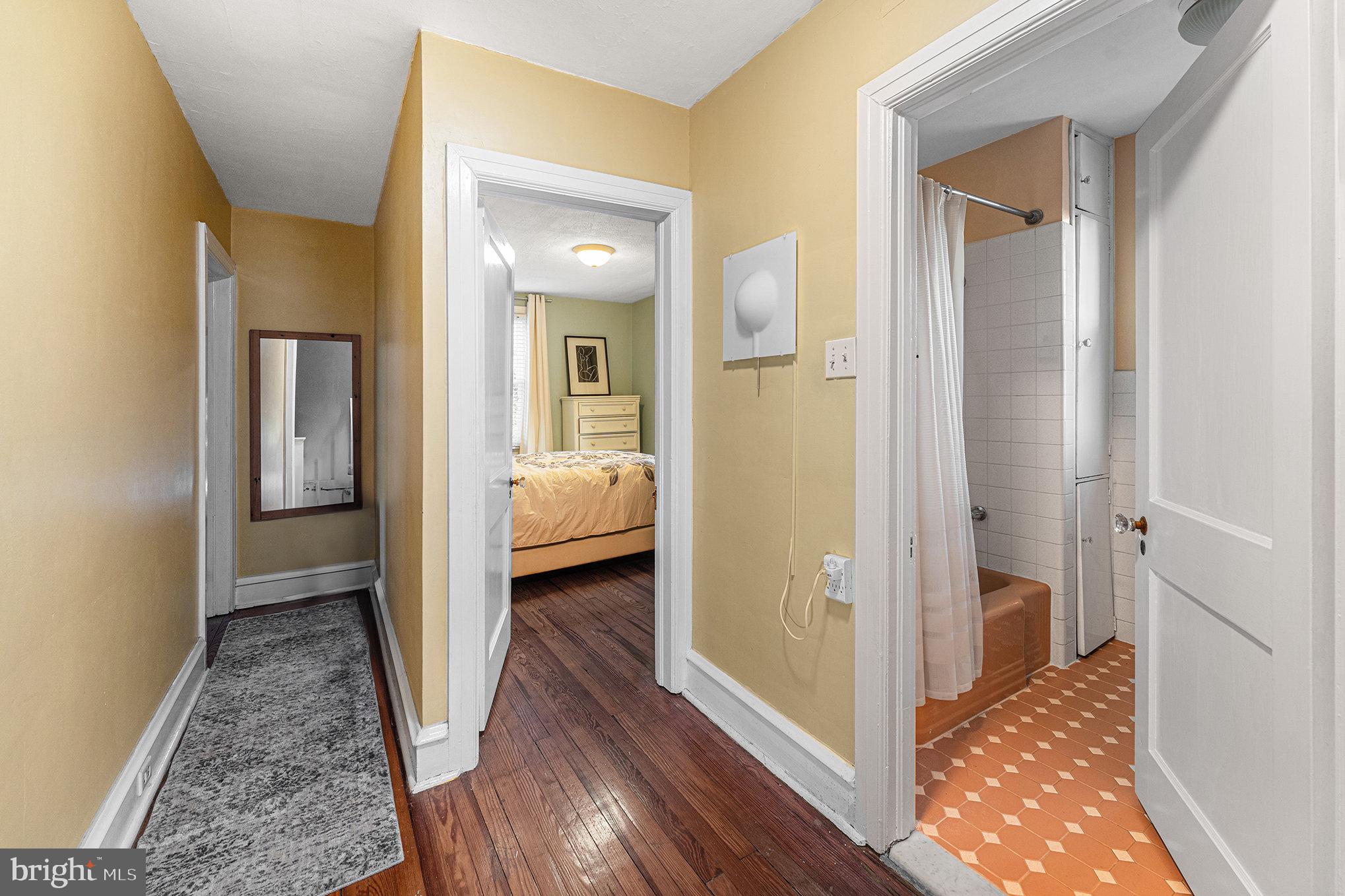 14 Springfield Avenue Flourtown, PA 19031 - Photo 16 of 34 a view of a bathroom from a hallway