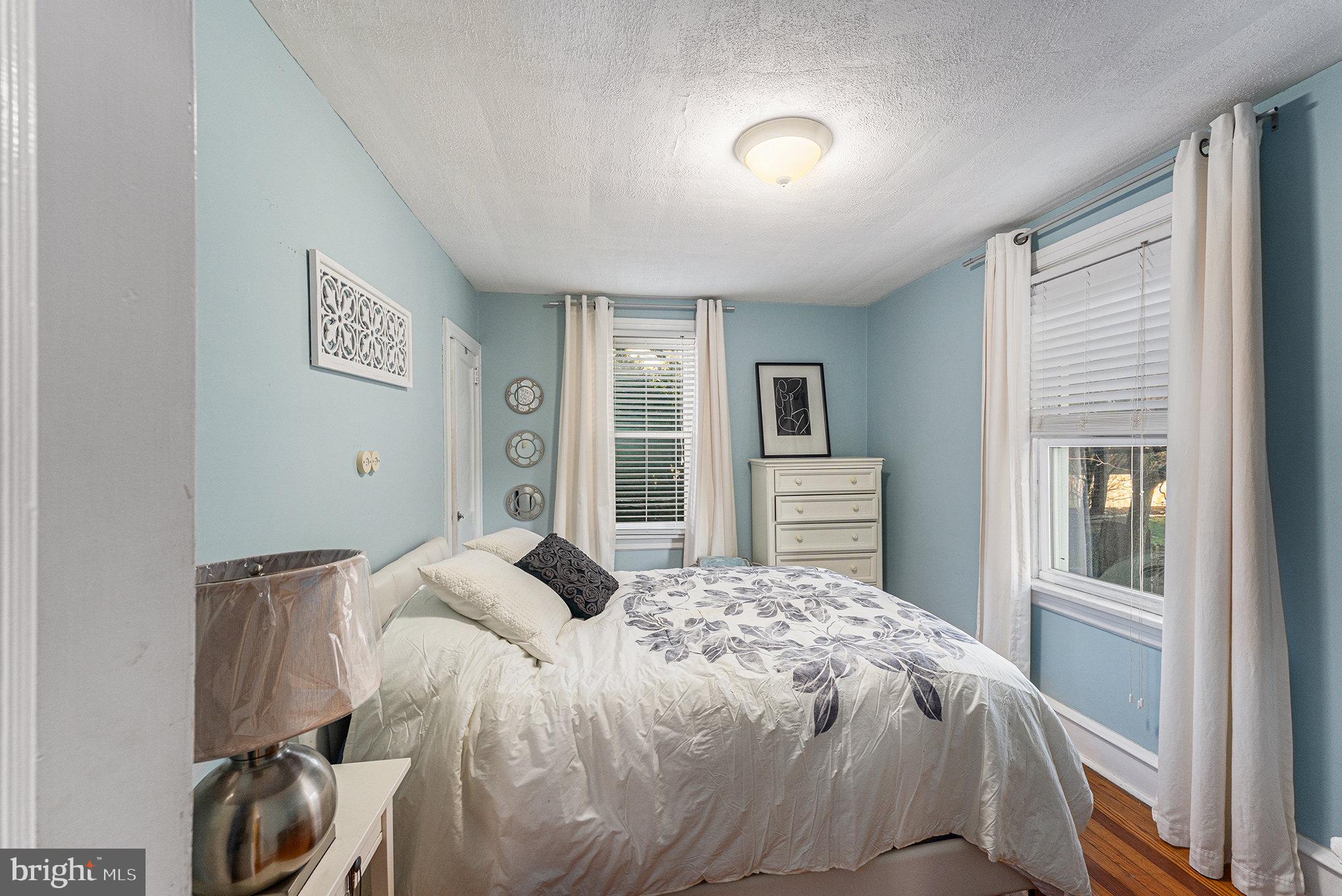 14 Springfield Avenue Flourtown, PA 19031 - Photo 19 of 34 a bedroom with a bed and a window