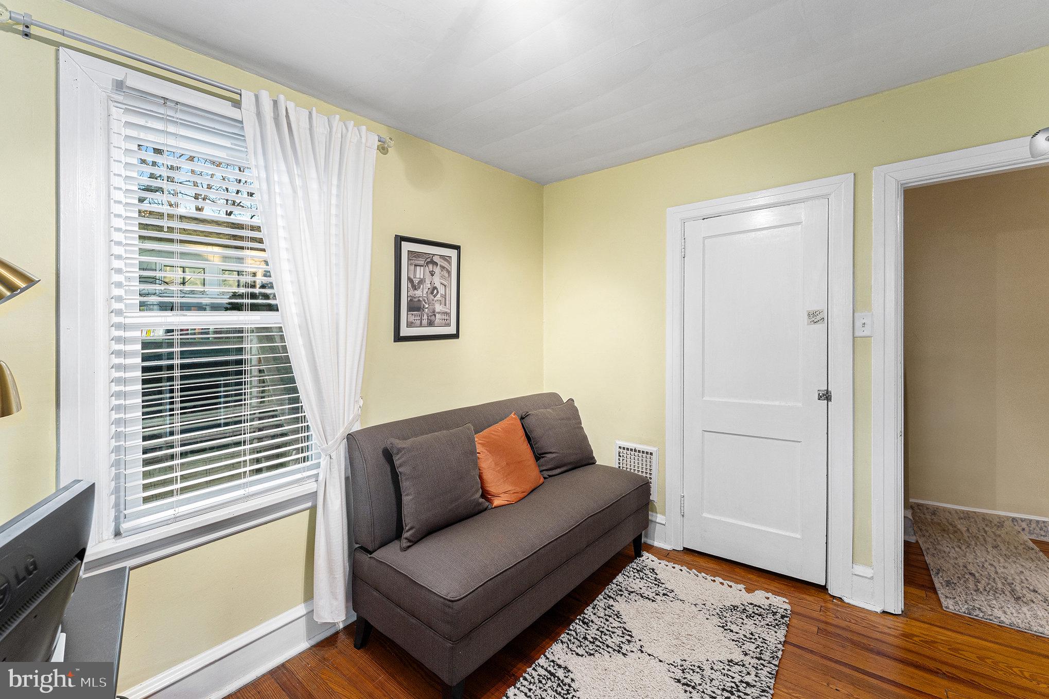 14 Springfield Avenue Flourtown, PA 19031 - Photo 22 of 34 a living room with furniture and a window