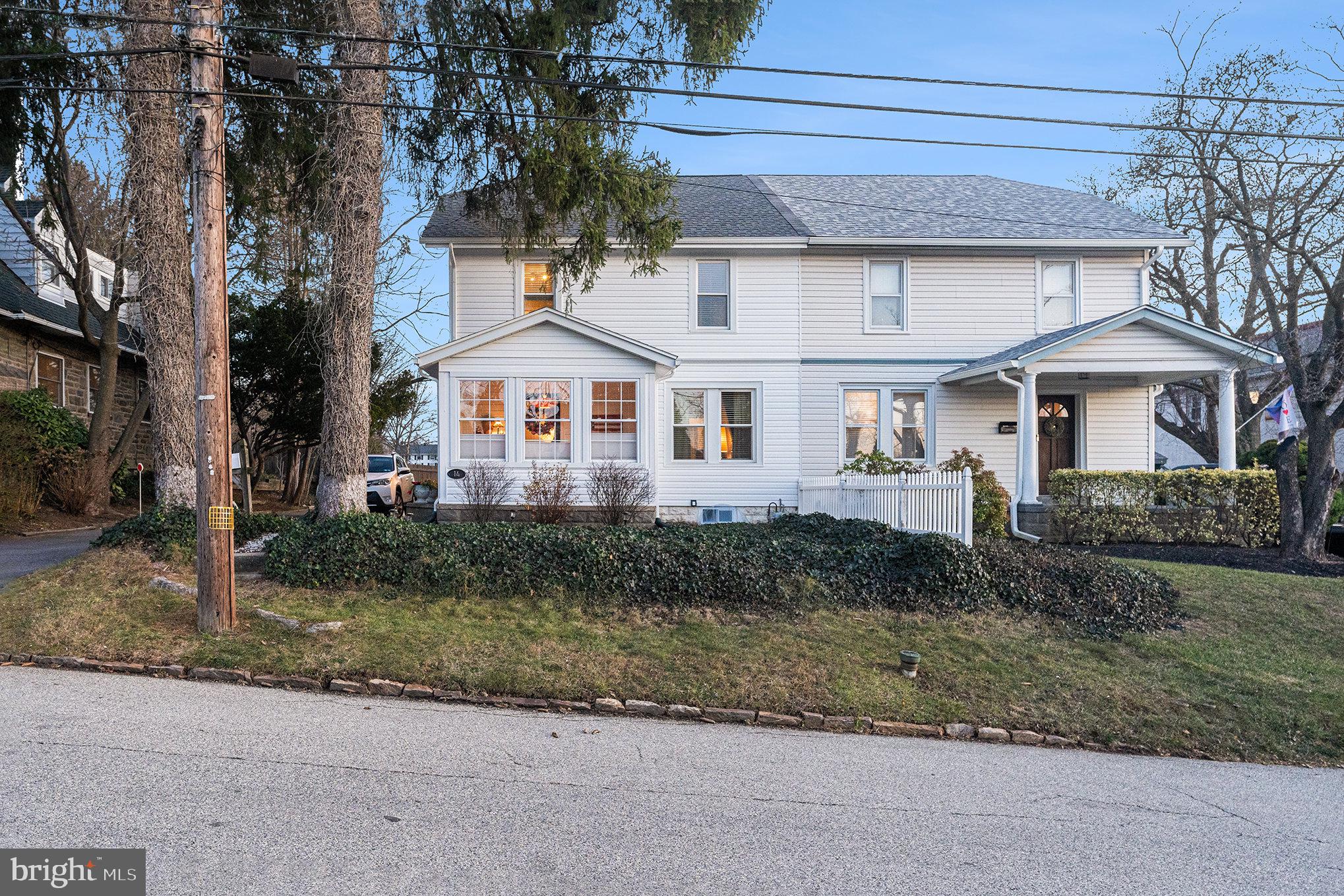 14 Springfield Avenue Flourtown, PA 19031 - Photo 3 of 34 a front view of a house with a yard