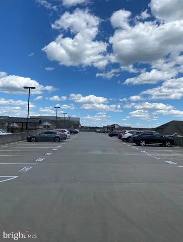 a view of a patio with a table and chairs