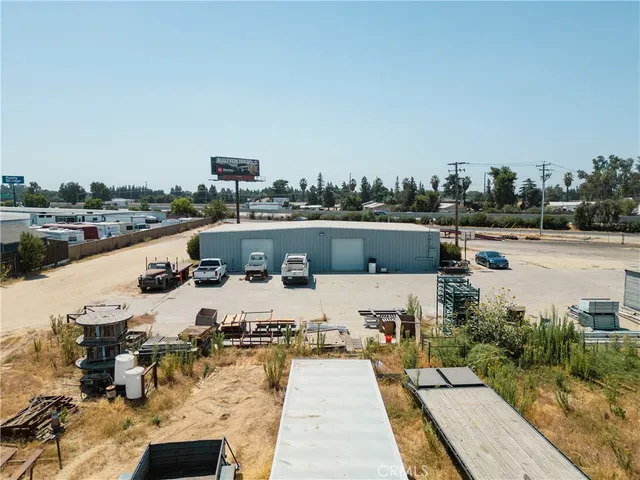 a view of a terrace with cars parked