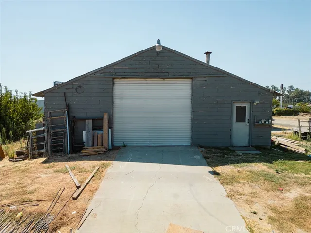 a view of swimming pool with lawn chairs