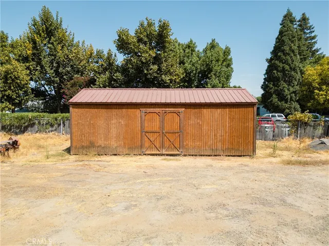 a view of a terrace with wooden fence