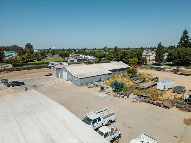 a view of a terrace with chairs and couches