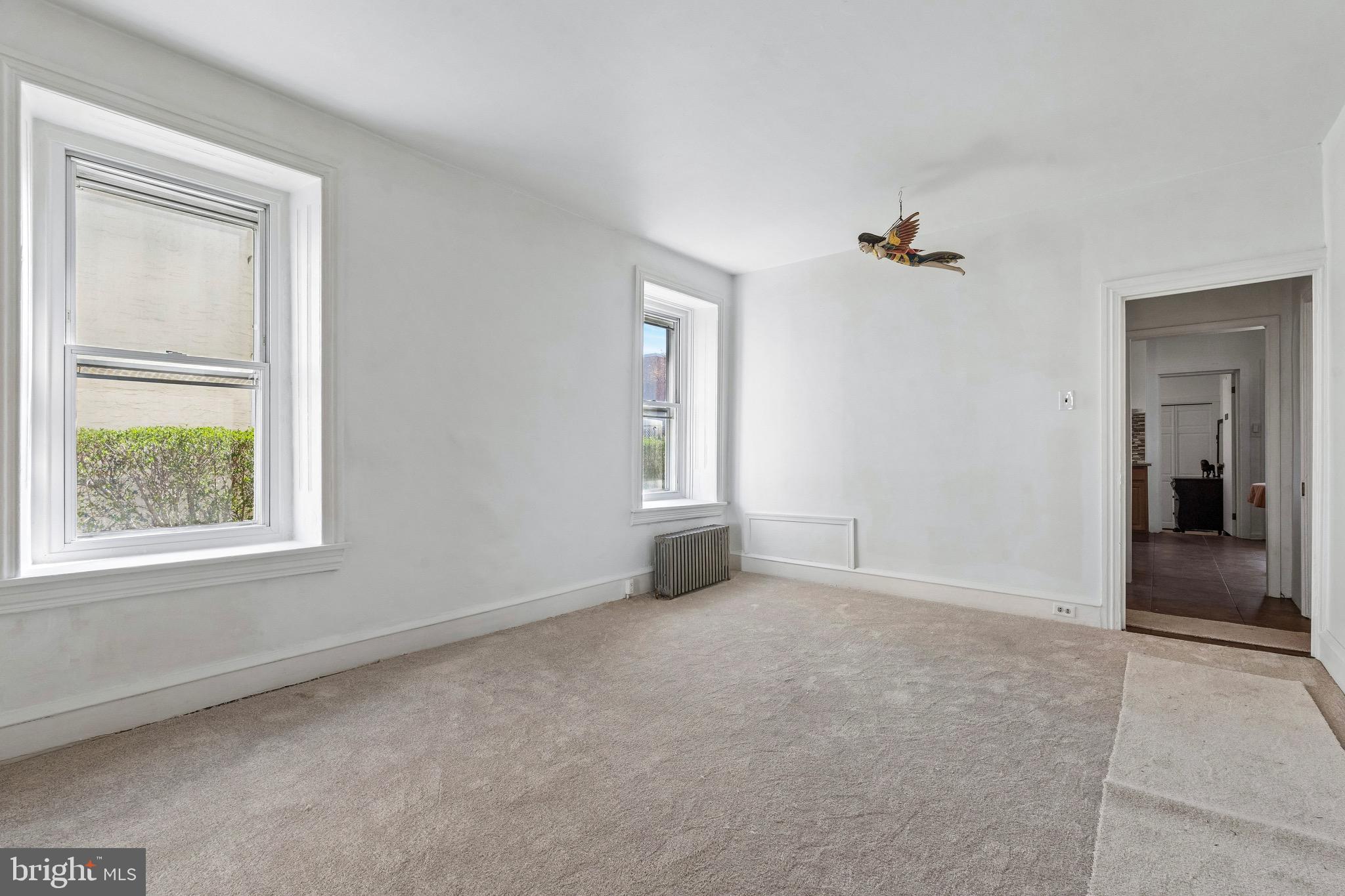 439 Lemonte Street Philadelphia, PA 19128 - Photo 12 of 42 an empty room with windows and closet