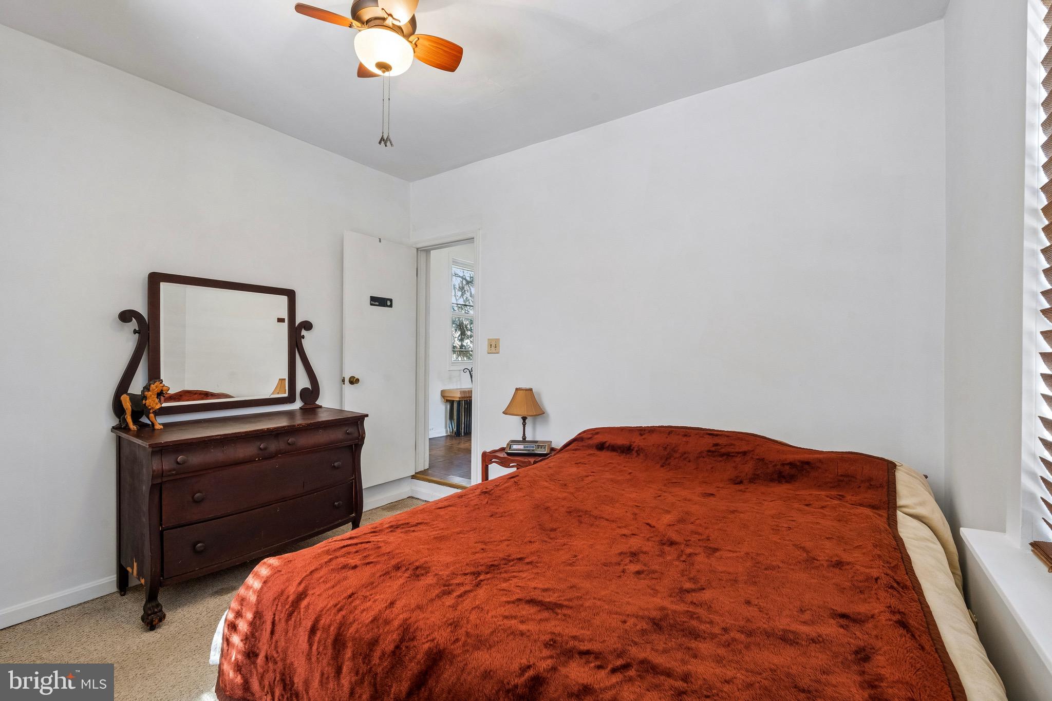 439 Lemonte Street Philadelphia, PA 19128 - Photo 20 of 42 a bedroom with a bed and a desk