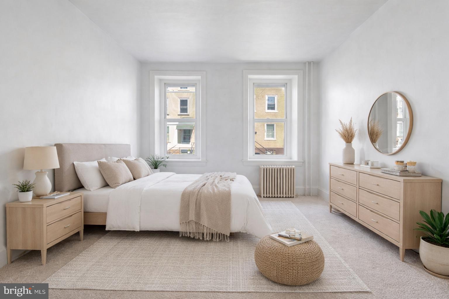 439 Lemonte Street Philadelphia, PA 19128 - Photo 3 of 42 a bedroom with bed and a large window