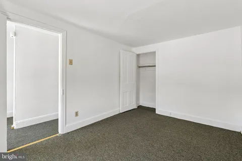 a view of empty room with a window