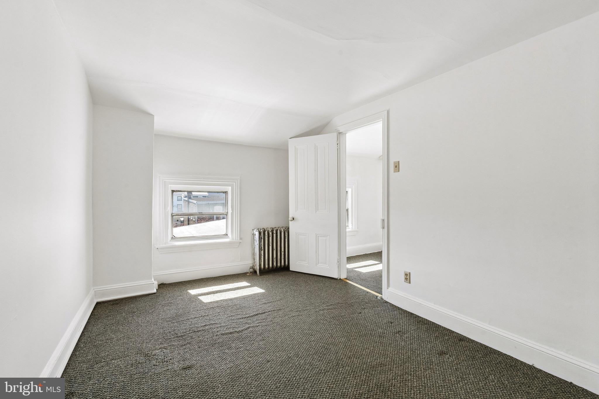 439 Lemonte Street Philadelphia, PA 19128 - Photo 32 of 42 a view of empty room with a window