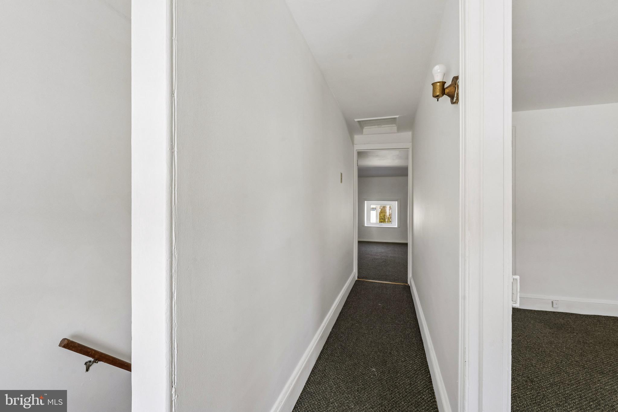 439 Lemonte Street Philadelphia, PA 19128 - Photo 33 of 42 a view of a hallway with wooden floor