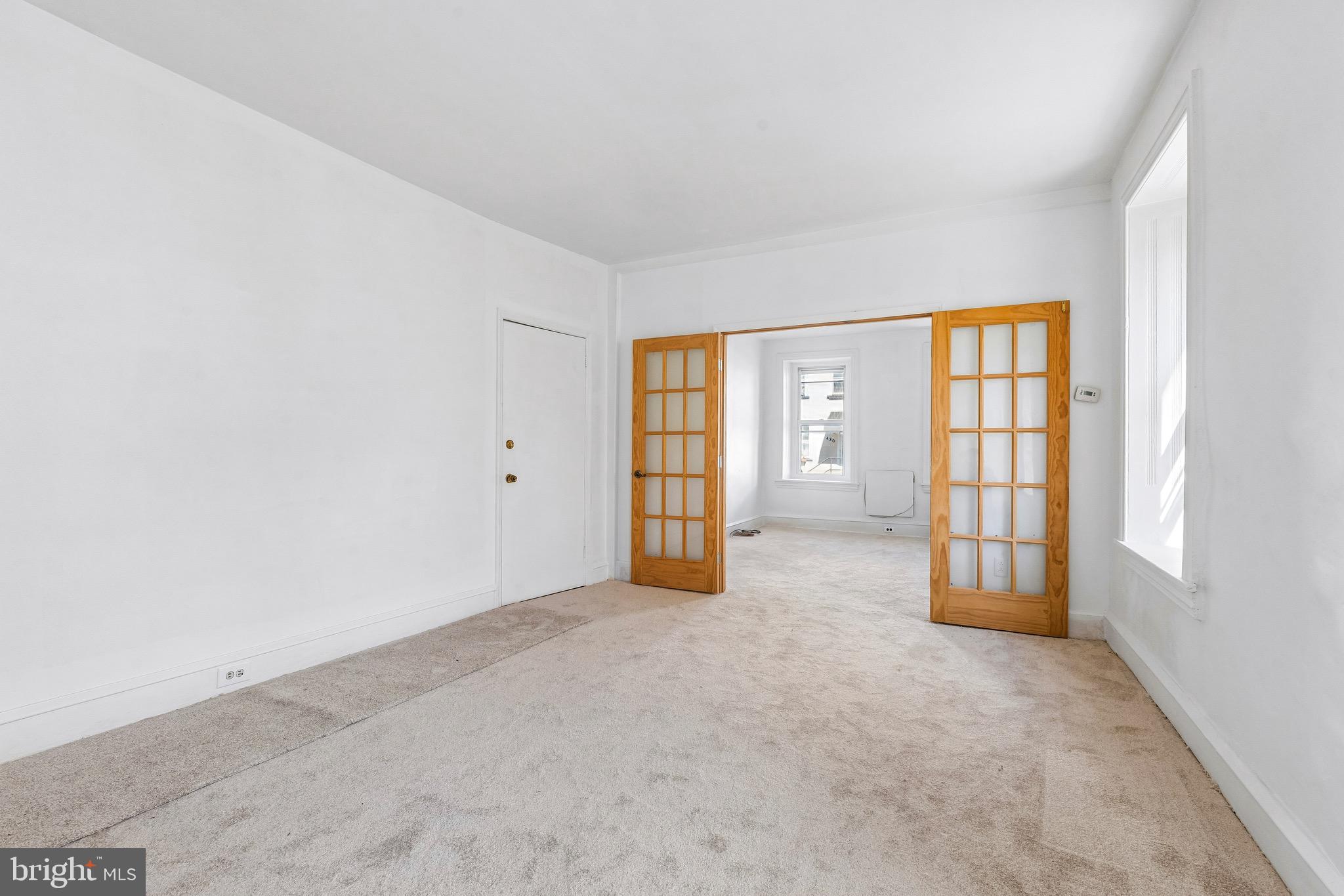 439 Lemonte Street Philadelphia, PA 19128 - Photo 10 of 42 an empty room with windows