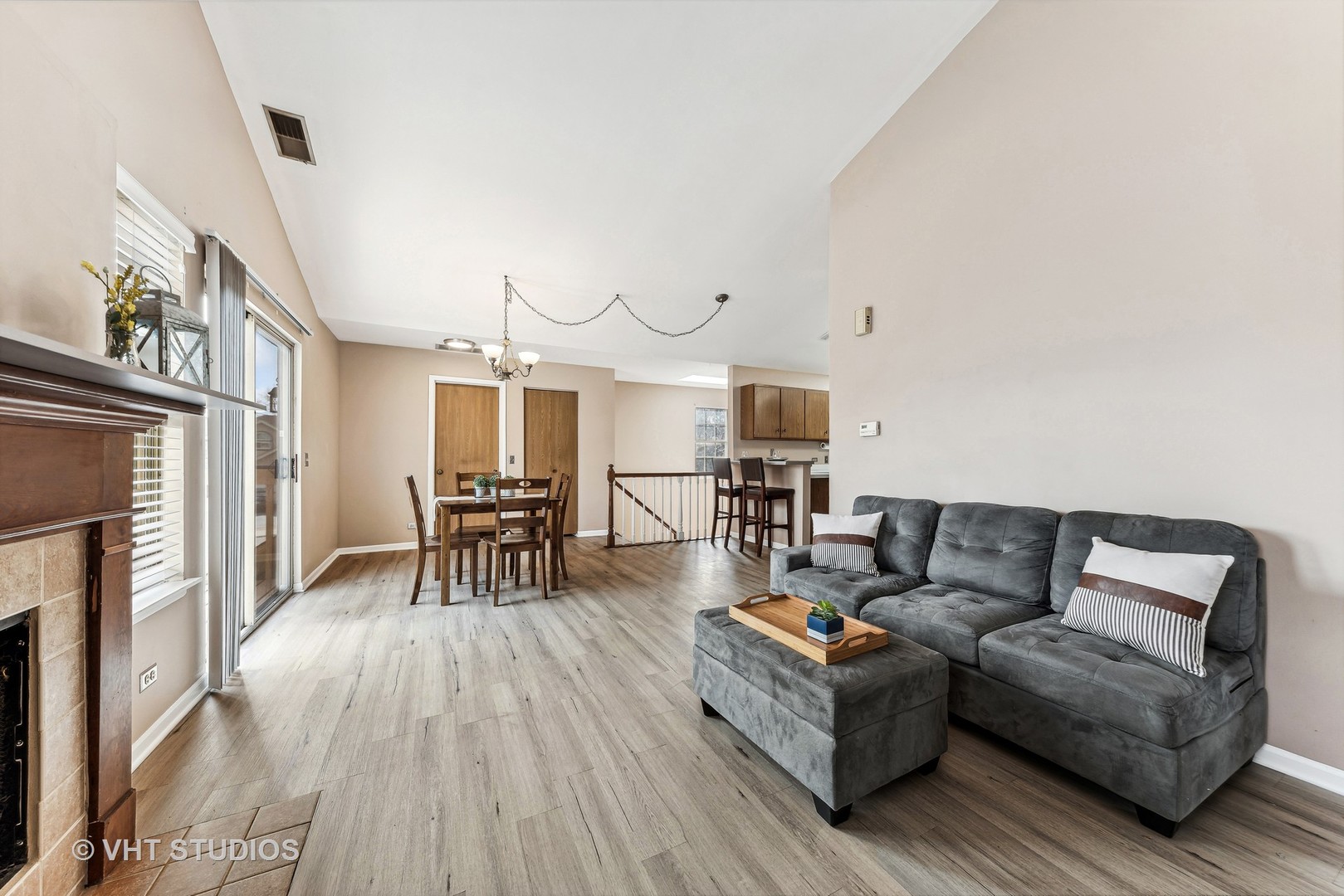 918 Ridgefield Lane Wheeling, IL 60090 - Photo 12 of 22 a living room with furniture and a fireplace