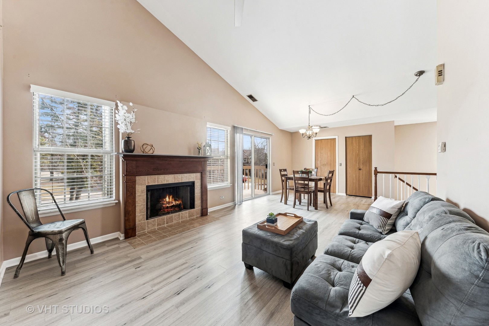 918 Ridgefield Lane Wheeling, IL 60090 - Photo 13 of 22 a living room with furniture and a fireplace