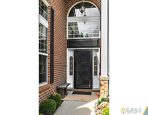 16 Pebble Creek Road Dayton, NJ 08810 - Photo 2 of 25 a picture of a door of the house