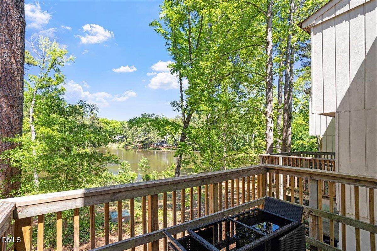 5045 Tall Pines Court Raleigh, NC 27609 - Photo 33 of 37 a view of a balcony with wooden floor