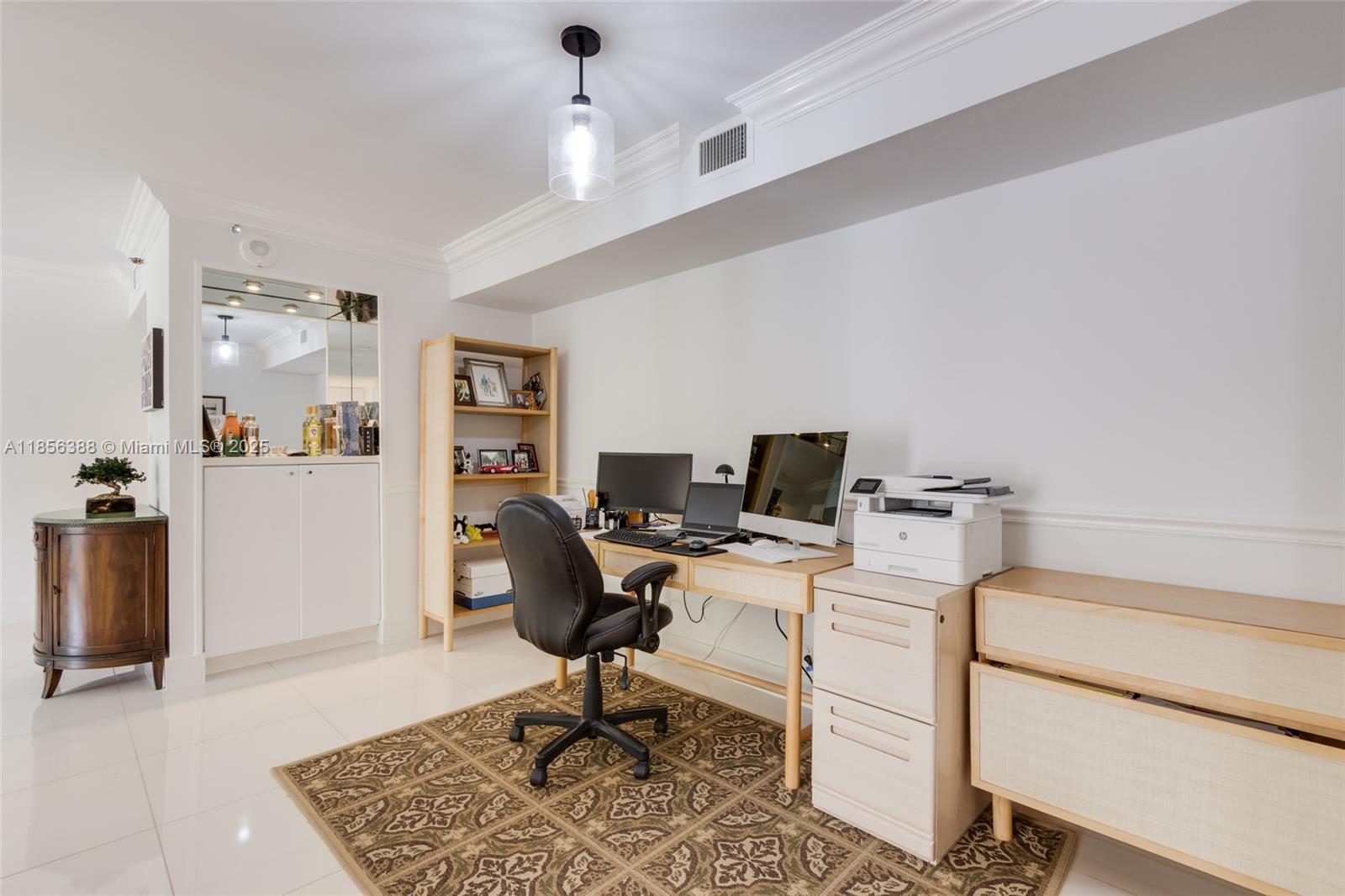2000 Towerside Terrace, Unit 406 Miami, FL 33138 - Photo 26 of 56 a view of a workspace with furniture and a window