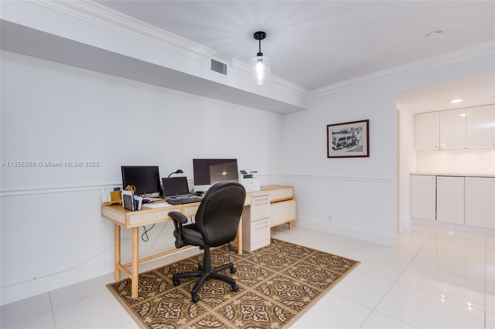 2000 Towerside Terrace, Unit 406 Miami, FL 33138 - Photo 27 of 56 a view of a workspace with furniture and a window