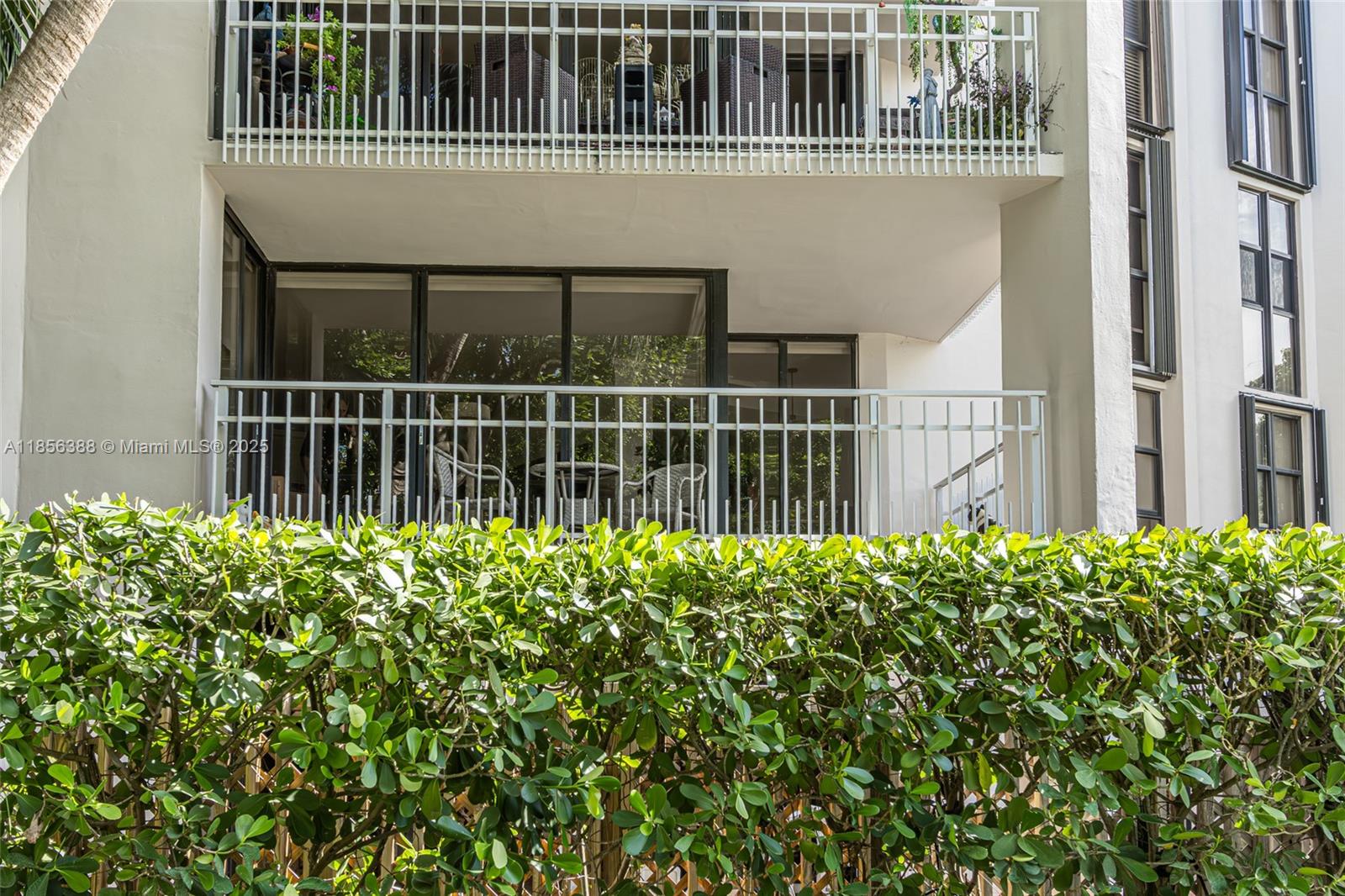 2000 Towerside Terrace, Unit 406 Miami, FL 33138 - Photo 34 of 56 a house view with a garden space