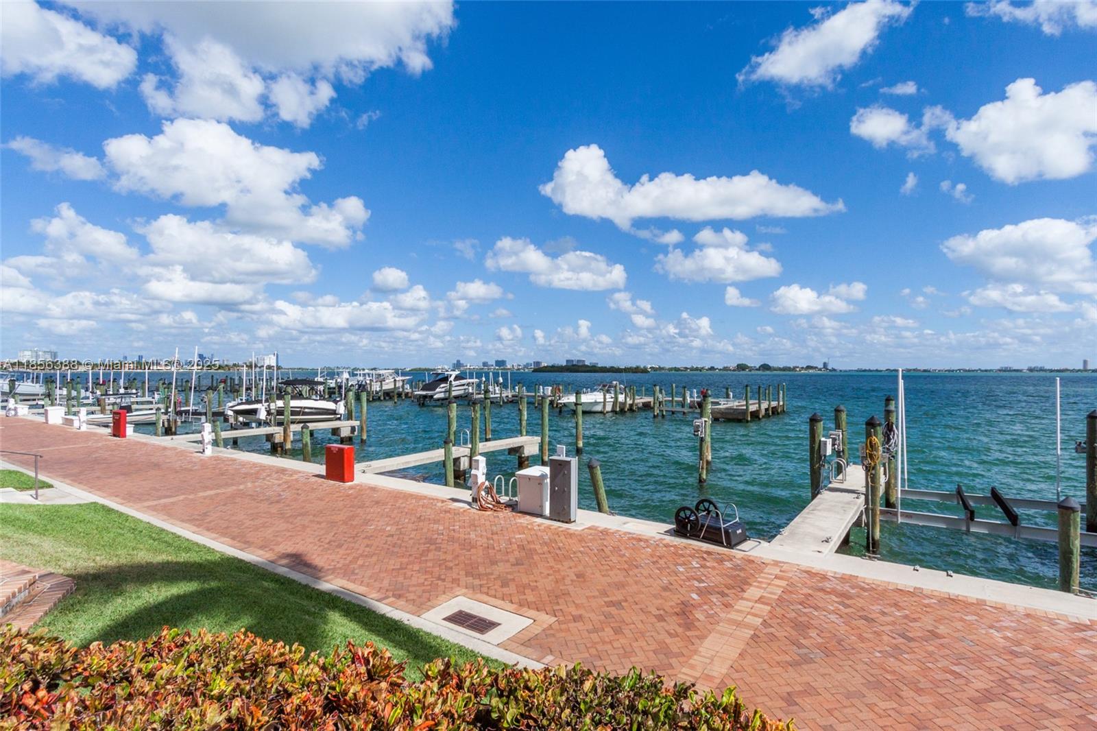 2000 Towerside Terrace, Unit 406 Miami, FL 33138 - Photo 35 of 56 a view of a lake with a yard