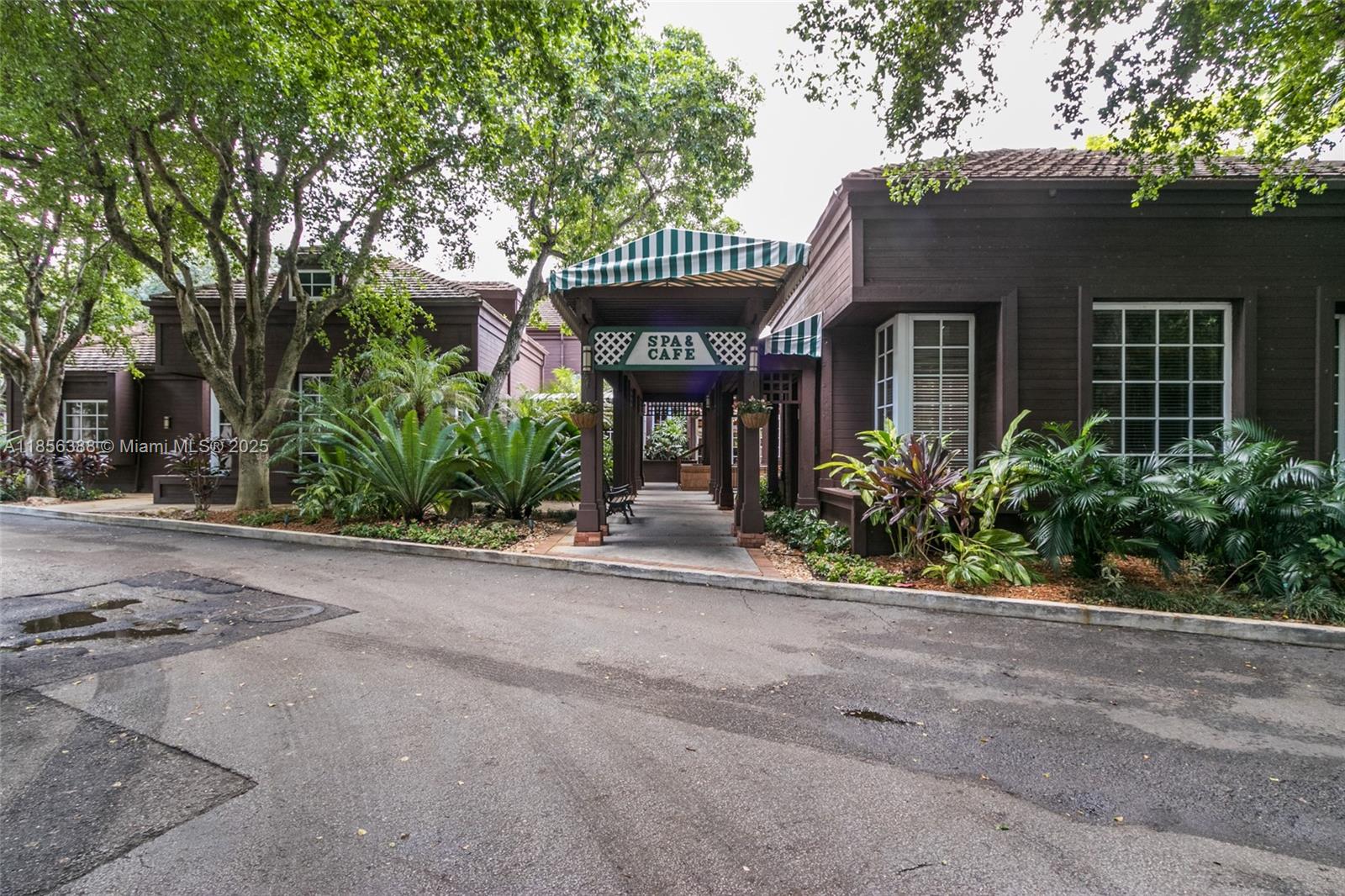 2000 Towerside Terrace, Unit 406 Miami, FL 33138 - Photo 43 of 56 front view of a house with a street