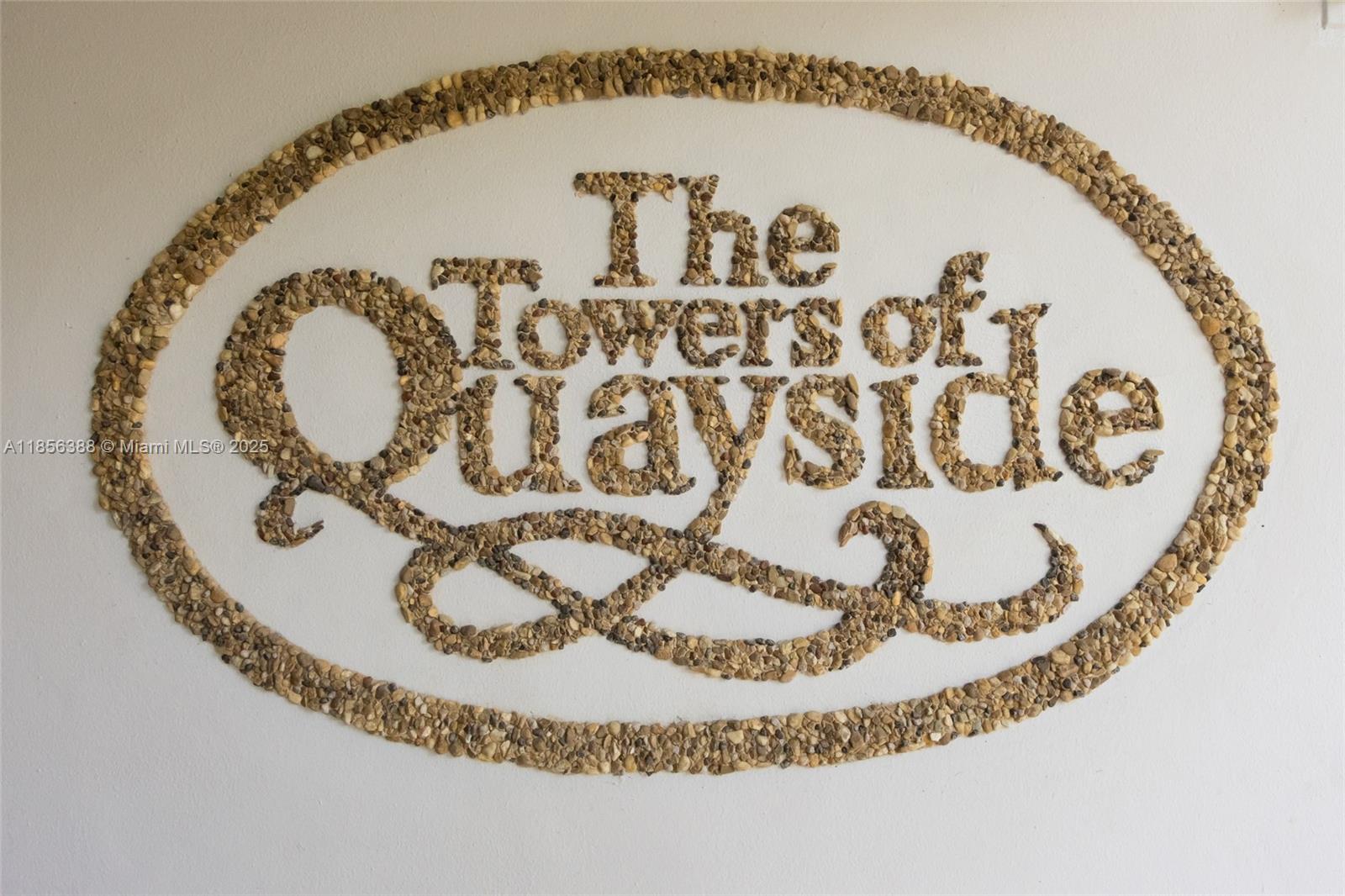 2000 Towerside Terrace, Unit 406 Miami, FL 33138 - Photo 55 of 56 a view of a wooden floor top space and kitchen view