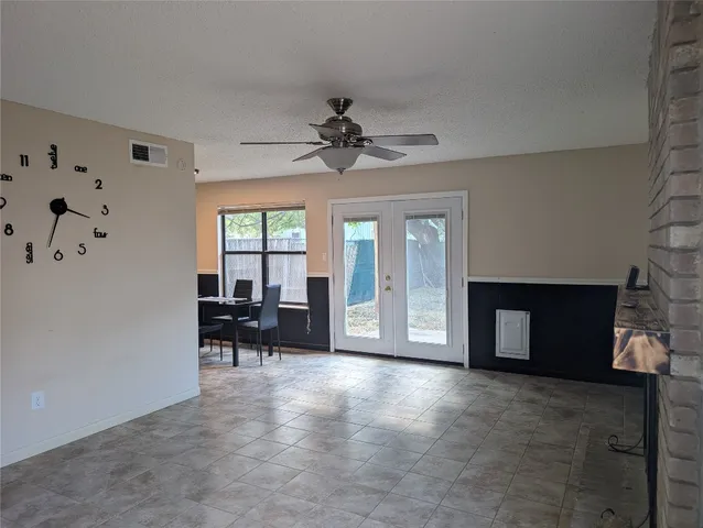 a view of a livingroom with furniture and a fireplace