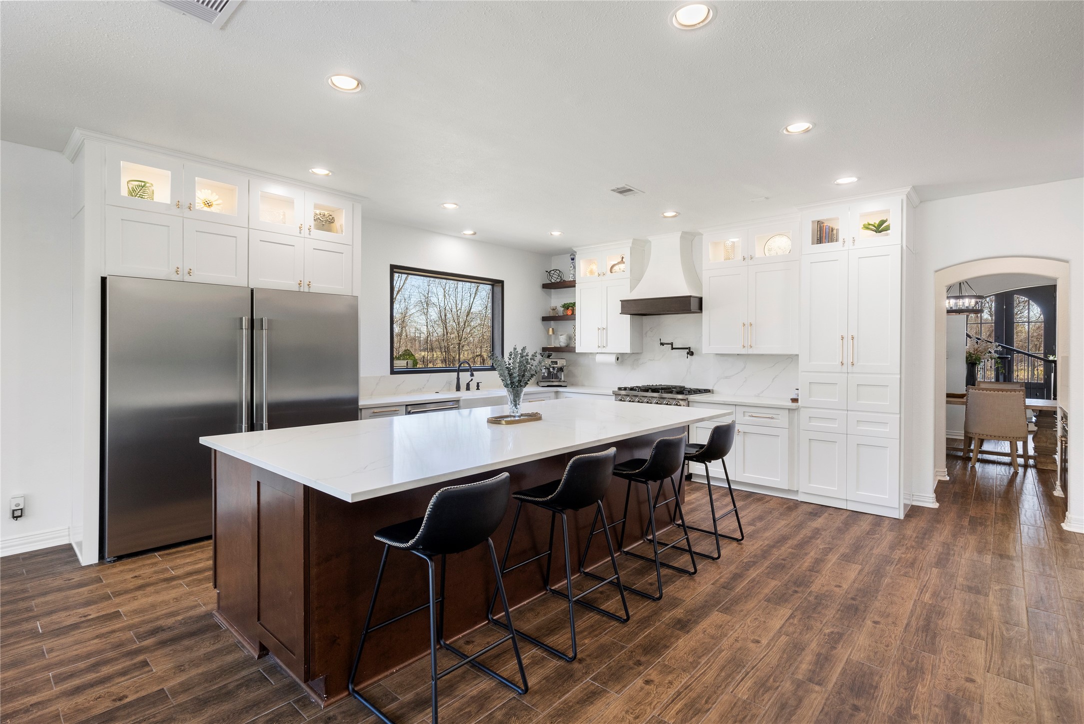 36345 Lady J Circle Wallis, TX 77485 - Photo 11 of 50 a kitchen with kitchen island granite countertop a sink a counter top stainless steel appliances and cabinets
