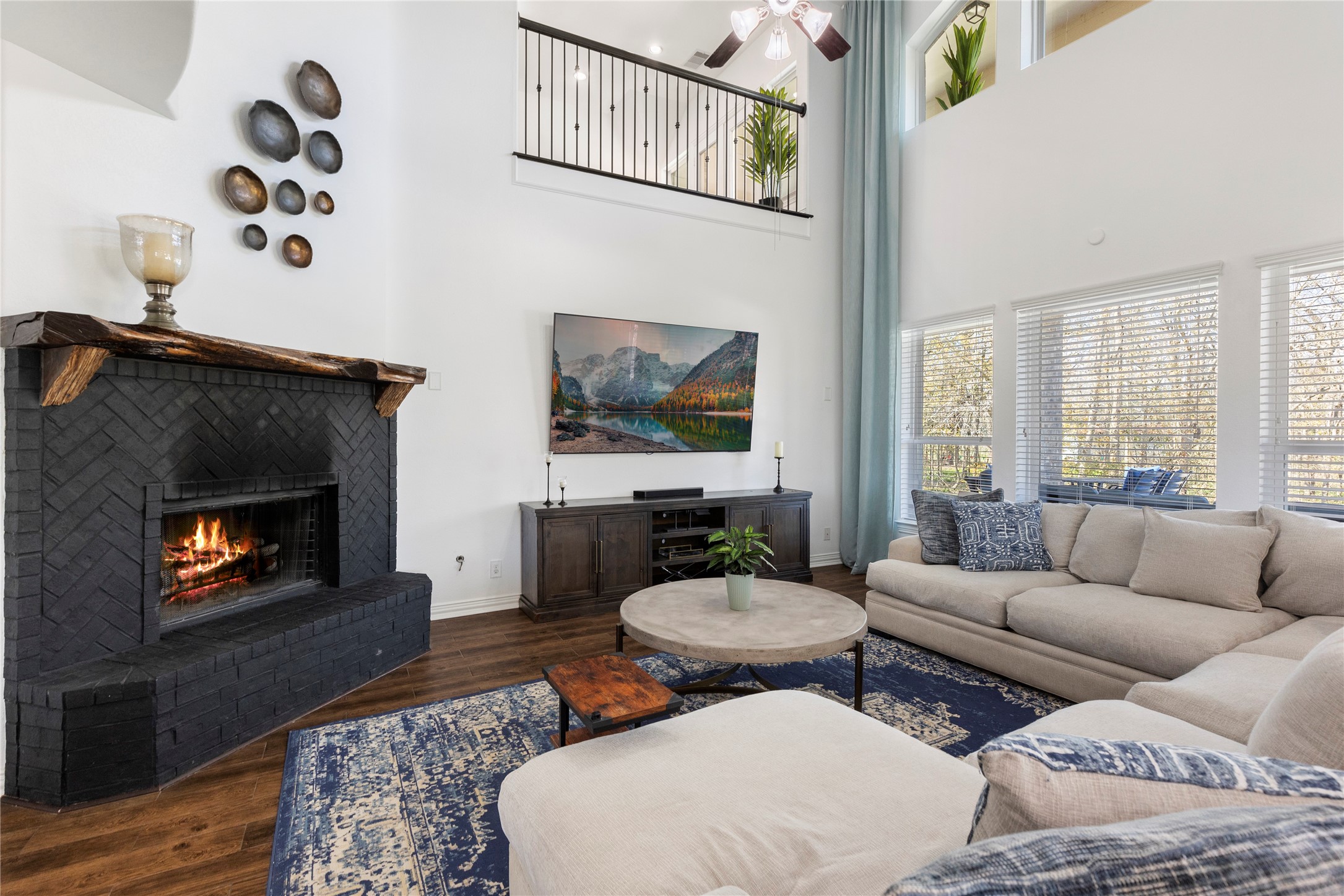 36345 Lady J Circle Wallis, TX 77485 - Photo 19 of 50 a living room with furniture a fireplace and a flat screen tv