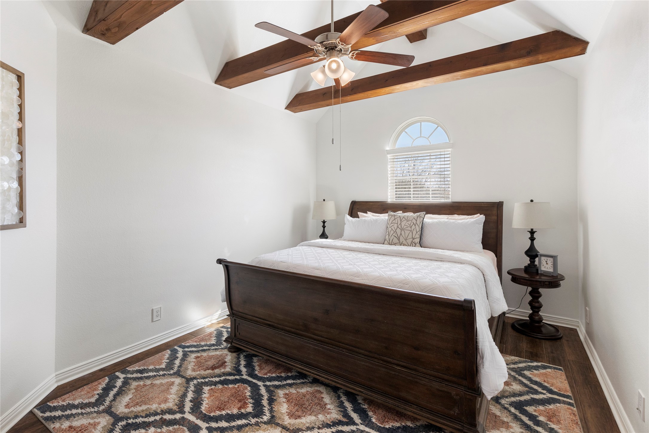 36345 Lady J Circle Wallis, TX 77485 - Photo 32 of 50 a bedroom with a bed and a chandelier