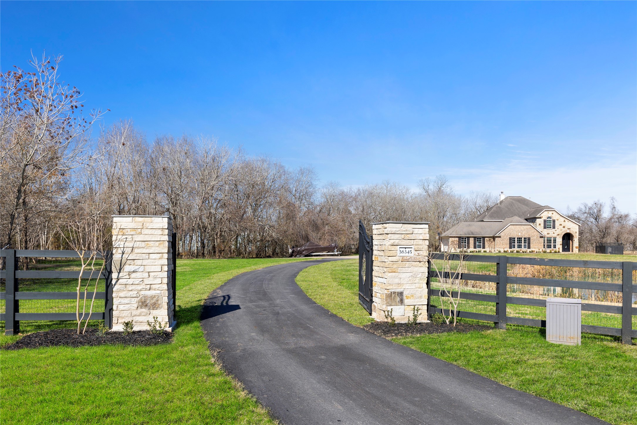 36345 Lady J Circle Wallis, TX 77485 - Photo 5 of 50 a view of a house with a big yard and a large trees