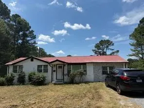a view of a house with patio
