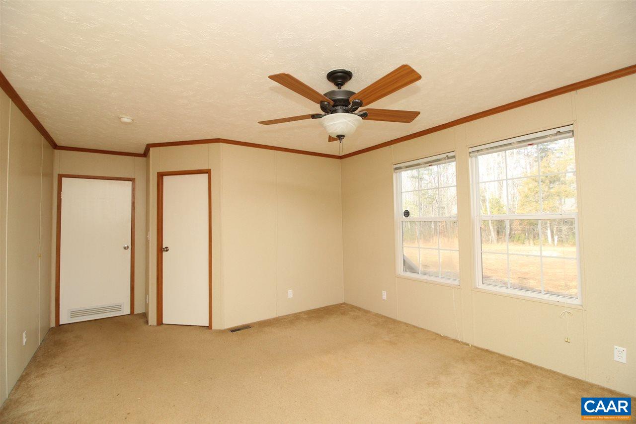 8568 Venable Road Kents Store, VA 23084 - Photo 5 of 11 a view of an empty room with a window