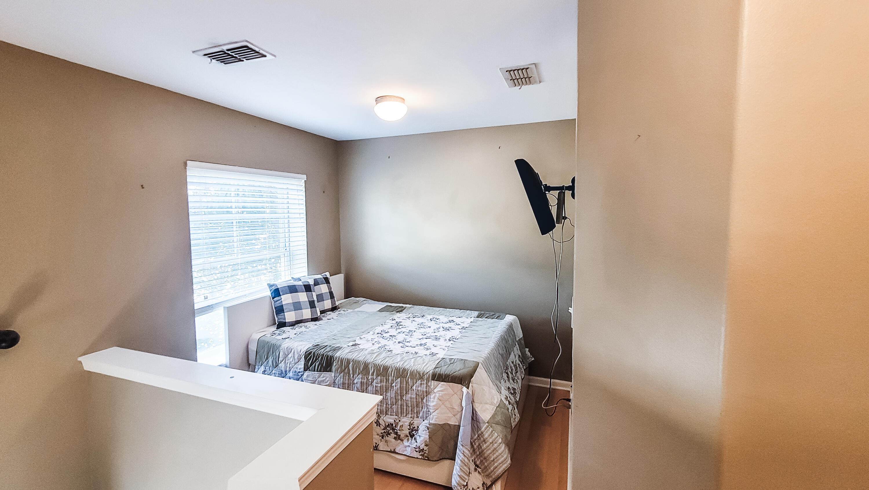 898 Solimar Way Mary Esther, FL 32569 - Photo 13 of 35 a bedroom with a bed and a dresser