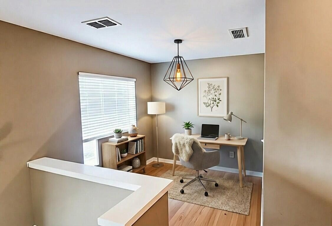 898 Solimar Way Mary Esther, FL 32569 - Photo 14 of 35 a view of a workspace with furniture and a window