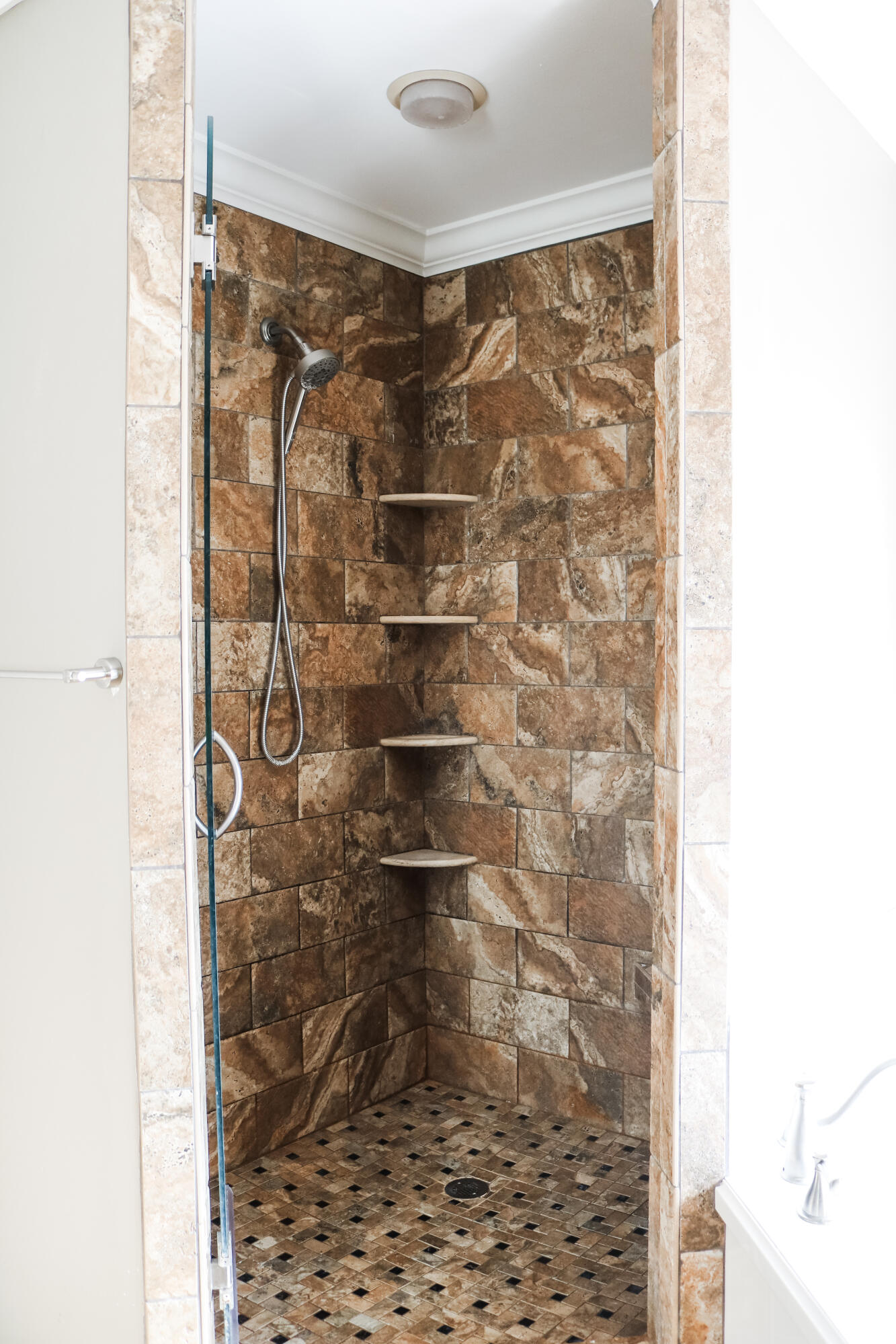 898 Solimar Way Mary Esther, FL 32569 - Photo 25 of 35 a bathroom with a shower and a glass door