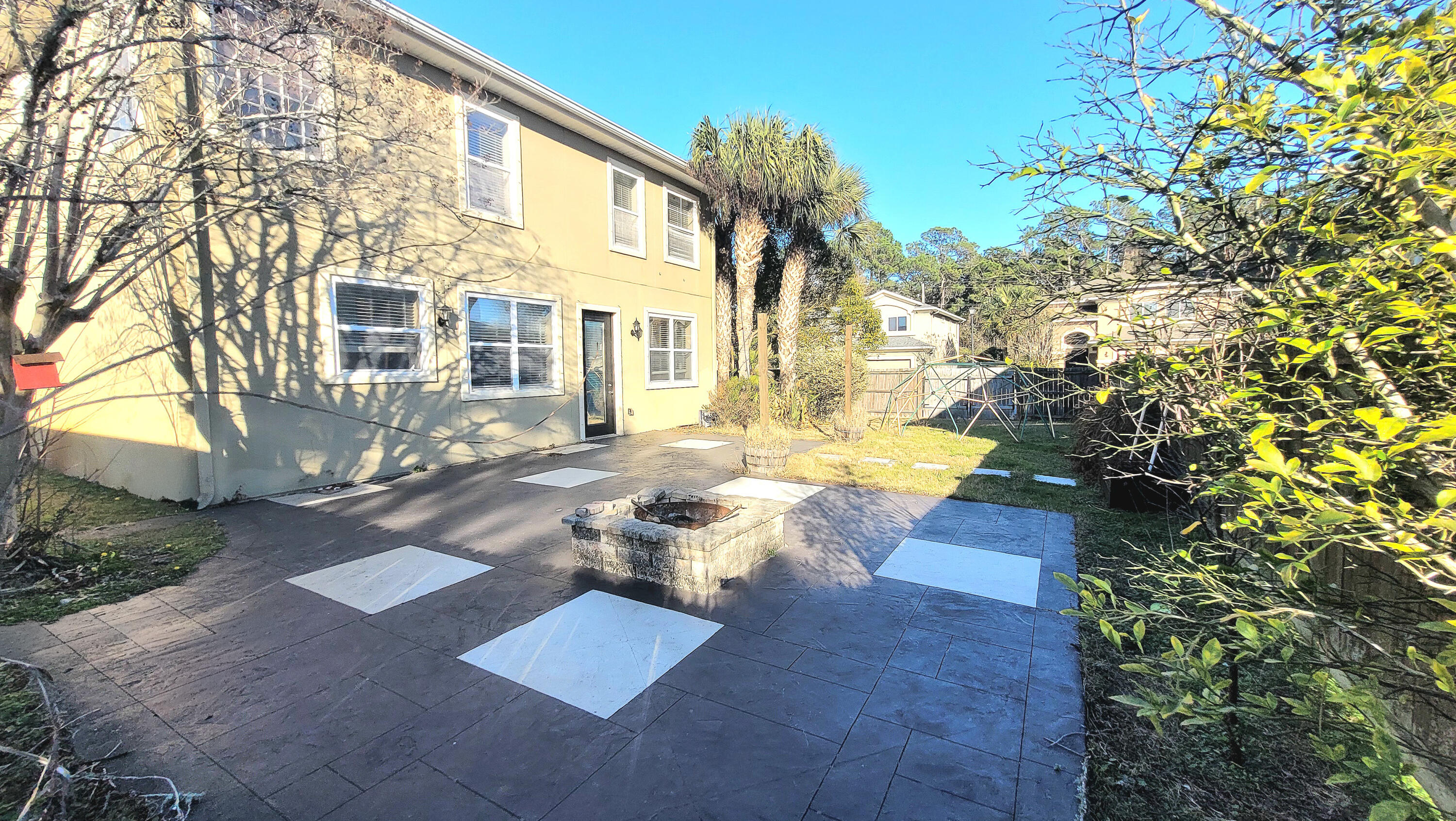 898 Solimar Way Mary Esther, FL 32569 - Photo 32 of 35 a view of a yard with plants and large trees