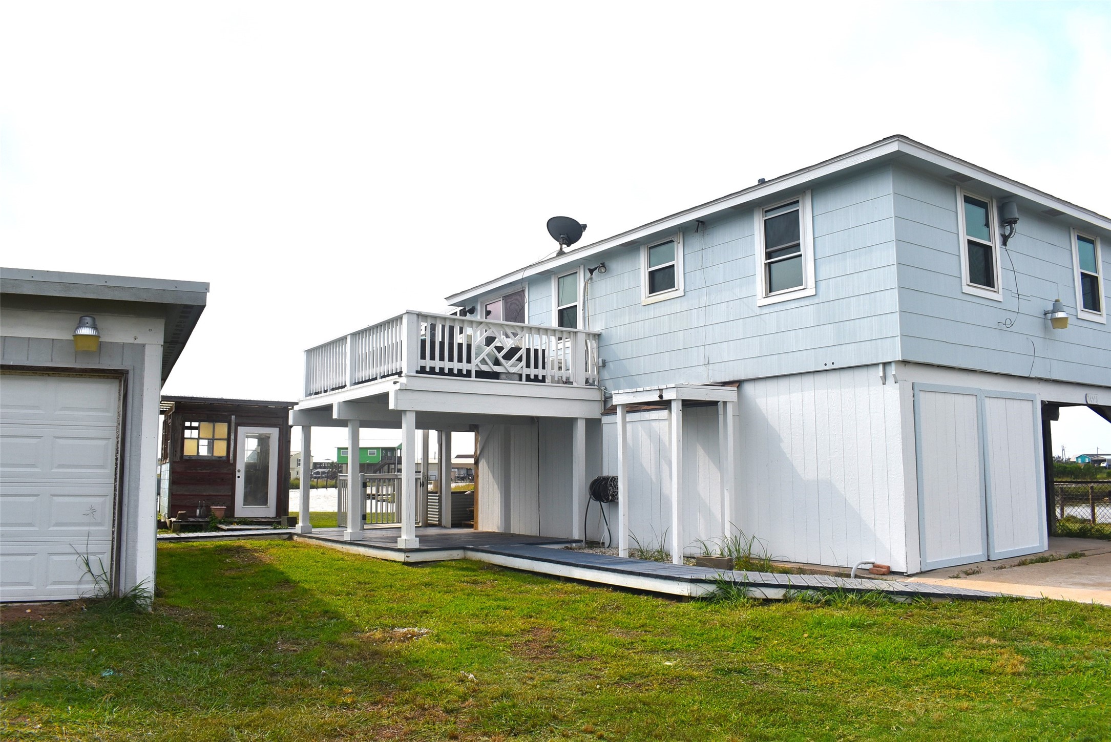 11 Chimaera Street Sargent, TX 77414 - Photo 12 of 43 Wooden walkway handicap accessible all the way up to the cargo lift for your convenience