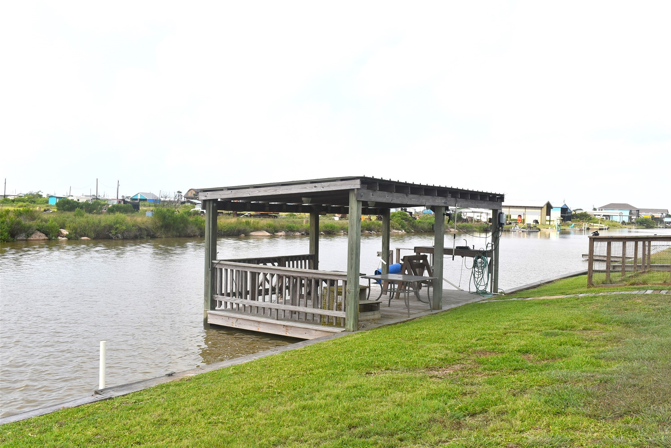 11 Chimaera Street Sargent, TX 77414 - Photo 22 of 43 This covered pier has electricity and water
