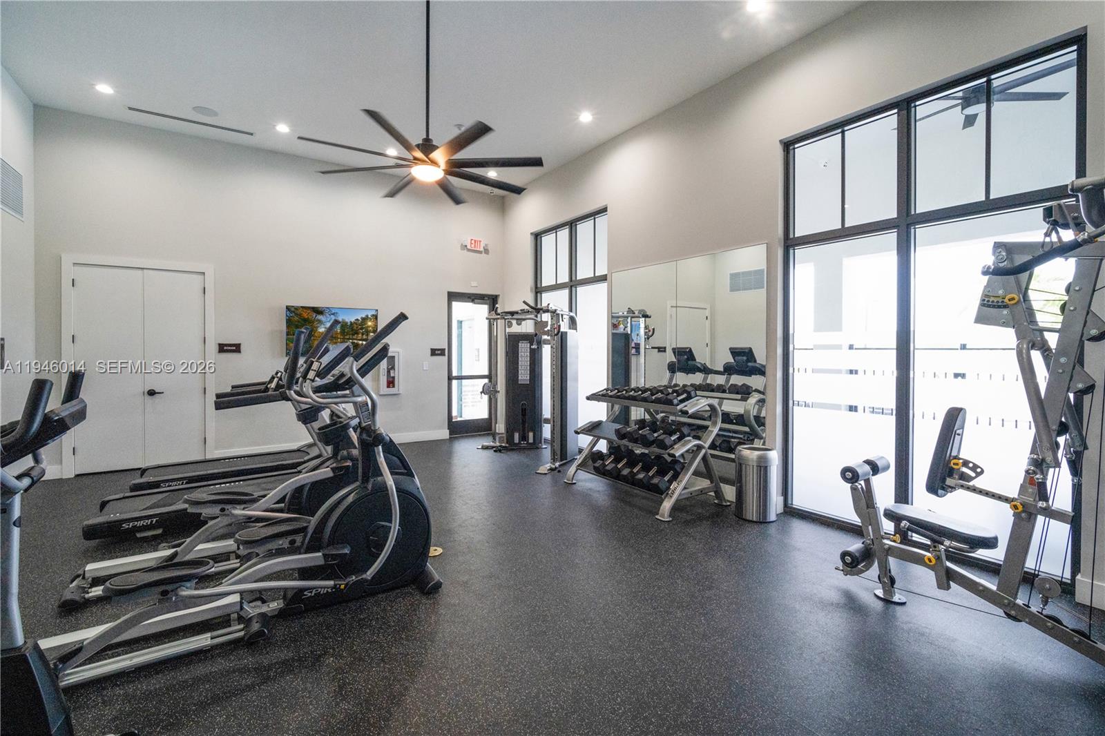 28574 Southwest 134th Court, Unit 28574 Homestead, FL 33033 - Photo 25 of 29 a view of a room with gym equipment