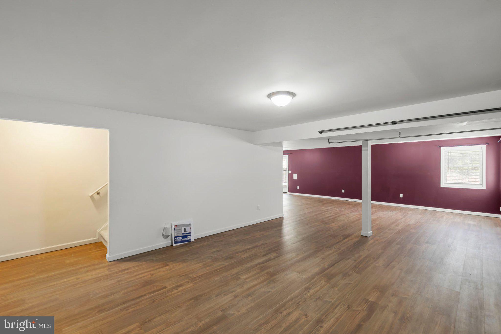 112 Colonial Drive Cross Junction, VA 22625 - Photo 22 of 45 a view of an empty room and wooden floor