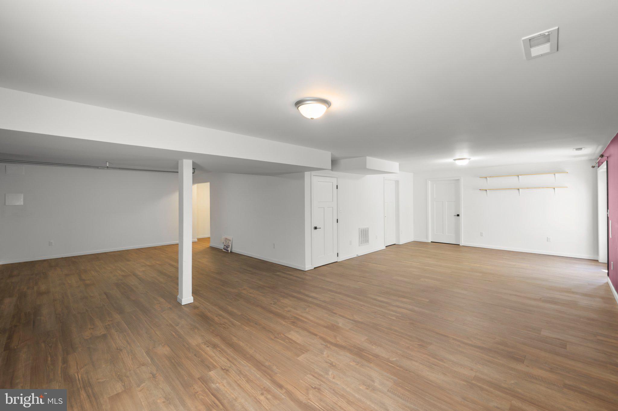 112 Colonial Drive Cross Junction, VA 22625 - Photo 24 of 45 a view of an empty room with wooden floor