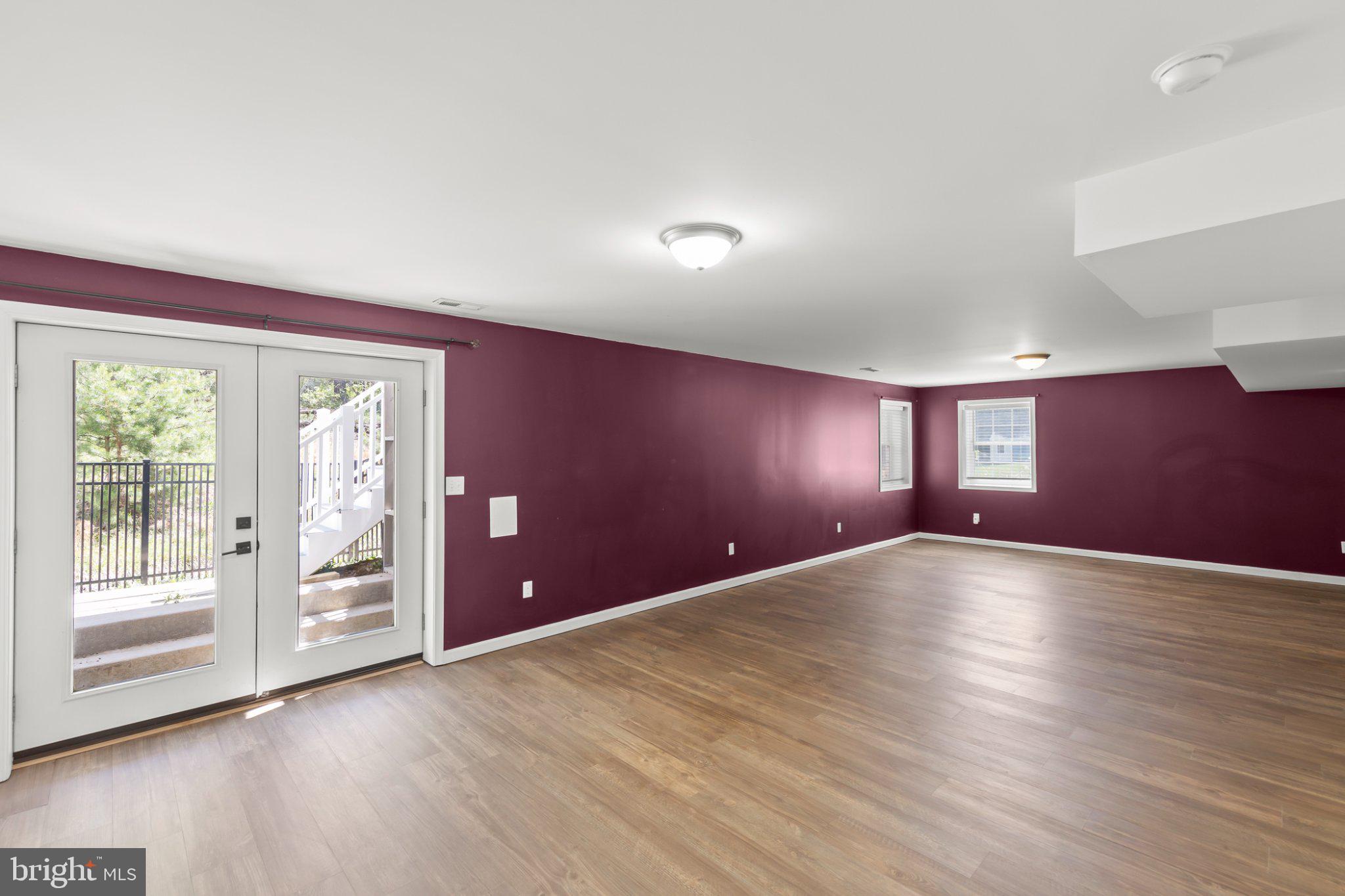 112 Colonial Drive Cross Junction, VA 22625 - Photo 25 of 45 a view of an empty room with wooden floor and a window