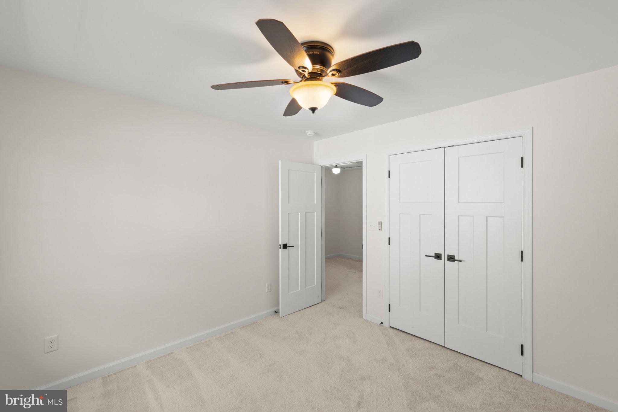 112 Colonial Drive Cross Junction, VA 22625 - Photo 29 of 45 an empty room with closet and ceiling fan