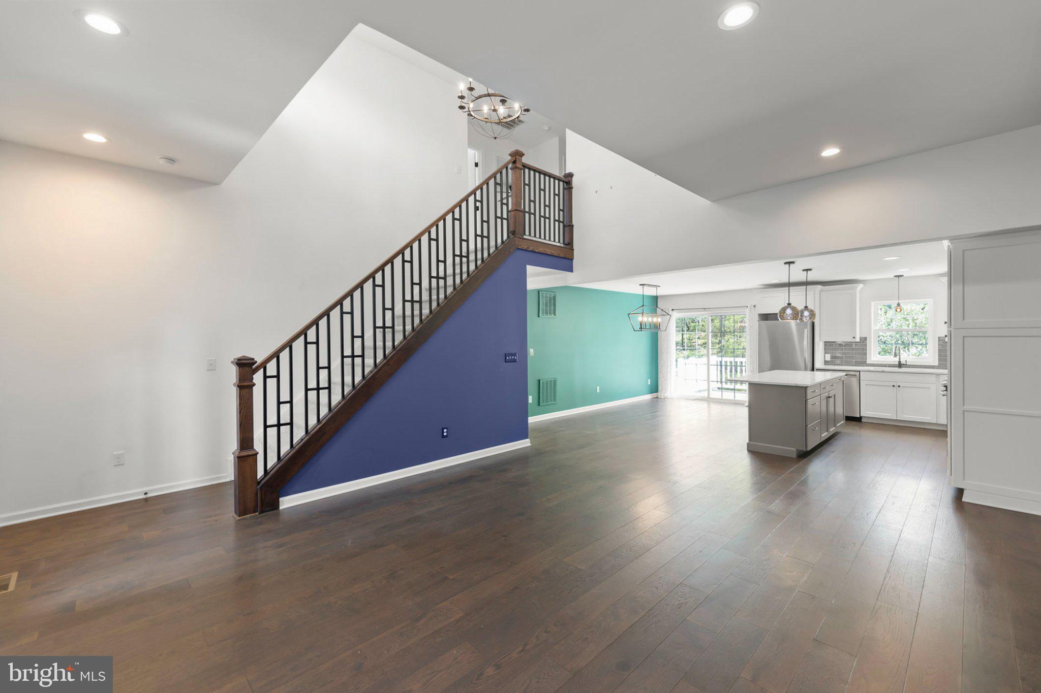 112 Colonial Drive Cross Junction, VA 22625 - Photo 3 of 45 a view of a livingroom with furniture stairs and a kitchen