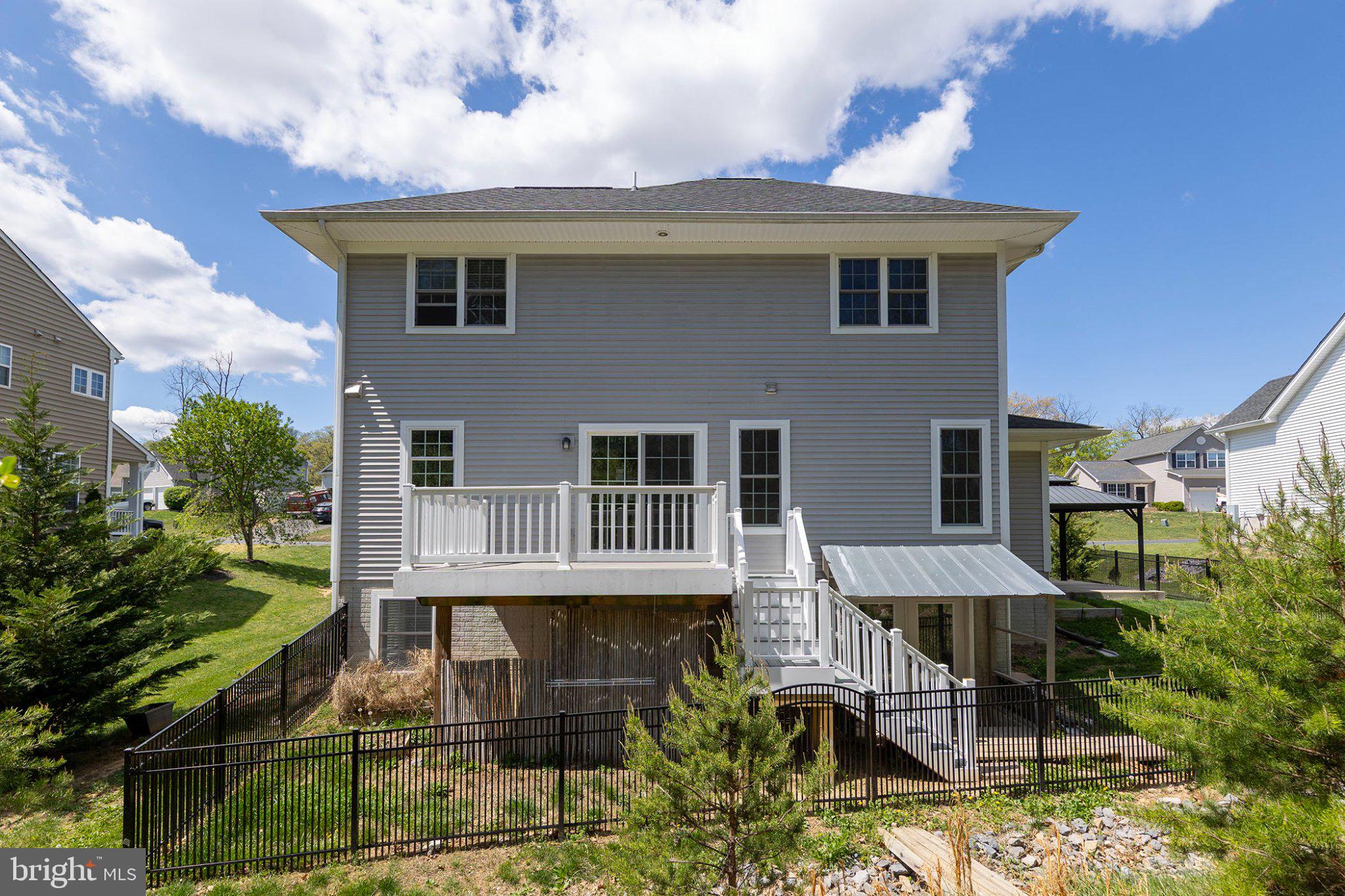 112 Colonial Drive Cross Junction, VA 22625 - Photo 42 of 45 a view of a house with backyard sitting area and garden