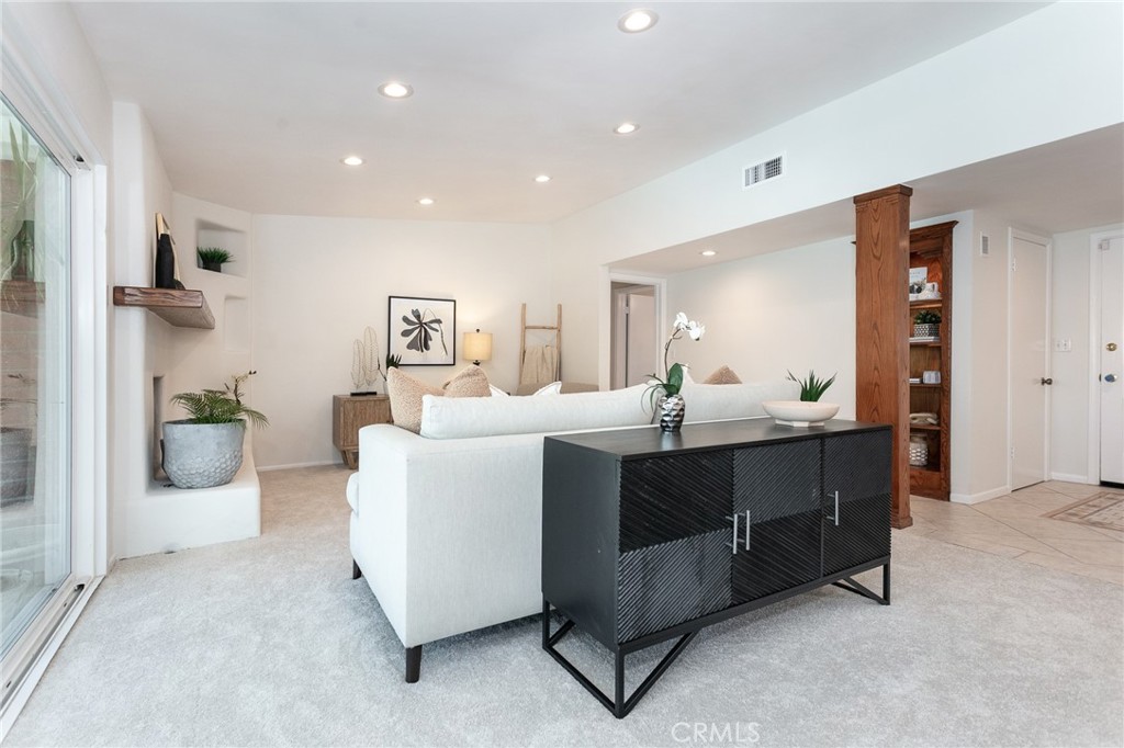 11017 Baird Avenue Porter Ranch, CA 91326 - Photo 7 of 35 a large room with a table and chairs