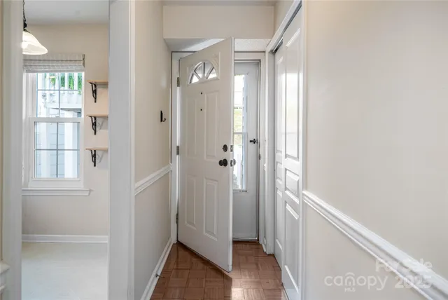 a view of a bathroom from the hallway