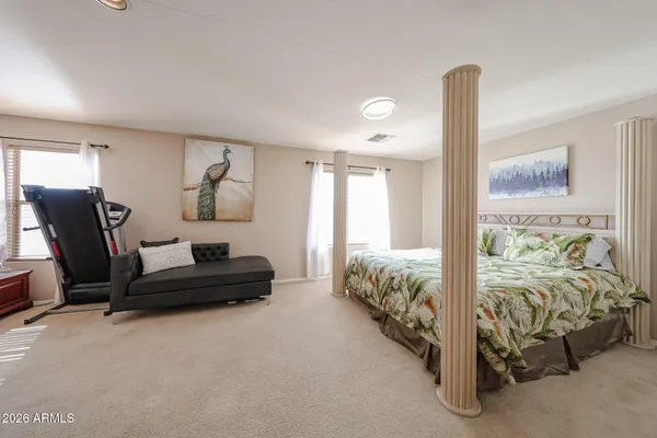 a white bath tub sitting next to a window