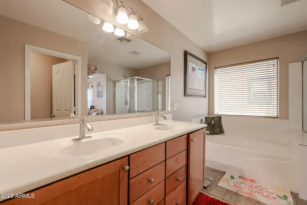 a view of a bedroom and bathroom